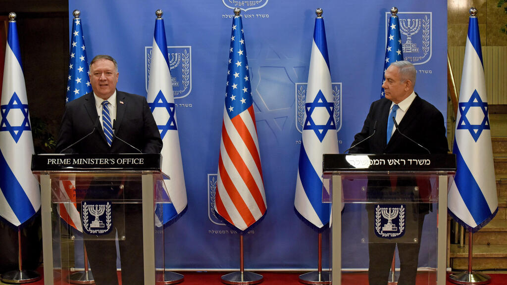 US Secretary of State Mike Pompeo (L) and Israeli Prime Minister Benjamin Netanyahu make a joint statement to the press after meeting in Jerusalem