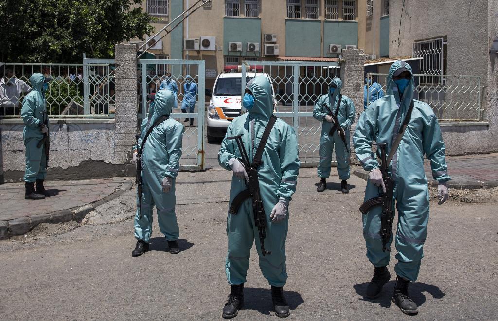 Gaza security forces in protective gear during drill (Photo: AP) Gaza security forces in protective gear during drill