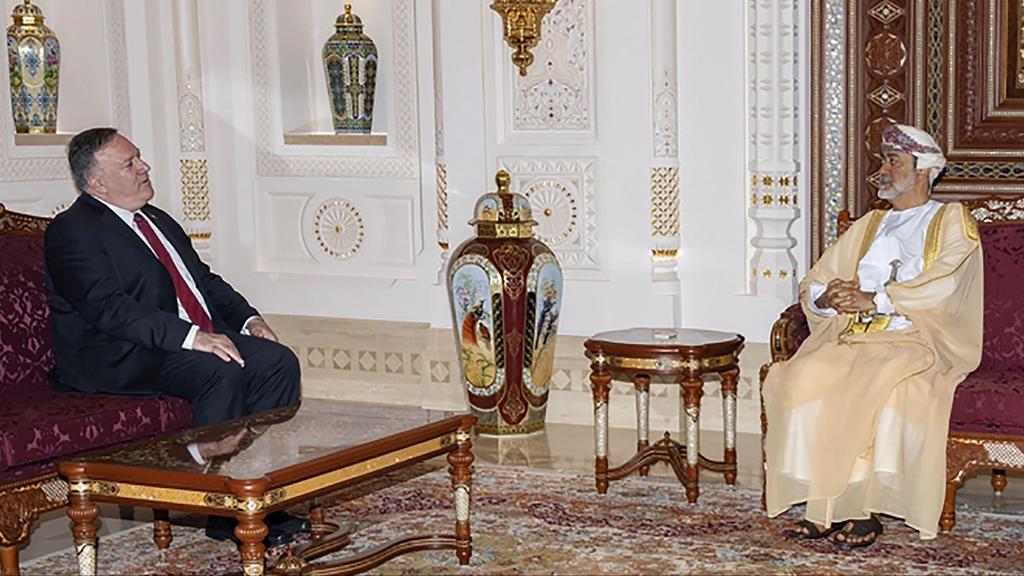 A handout picture released by the Omani Royal Palace on August 27, 2020 shows Sultan Haitham bin Tariq (R) receiving US Secretary of State Mike Pompeo (C) at al-Barakah Palace in the capital Muscat 