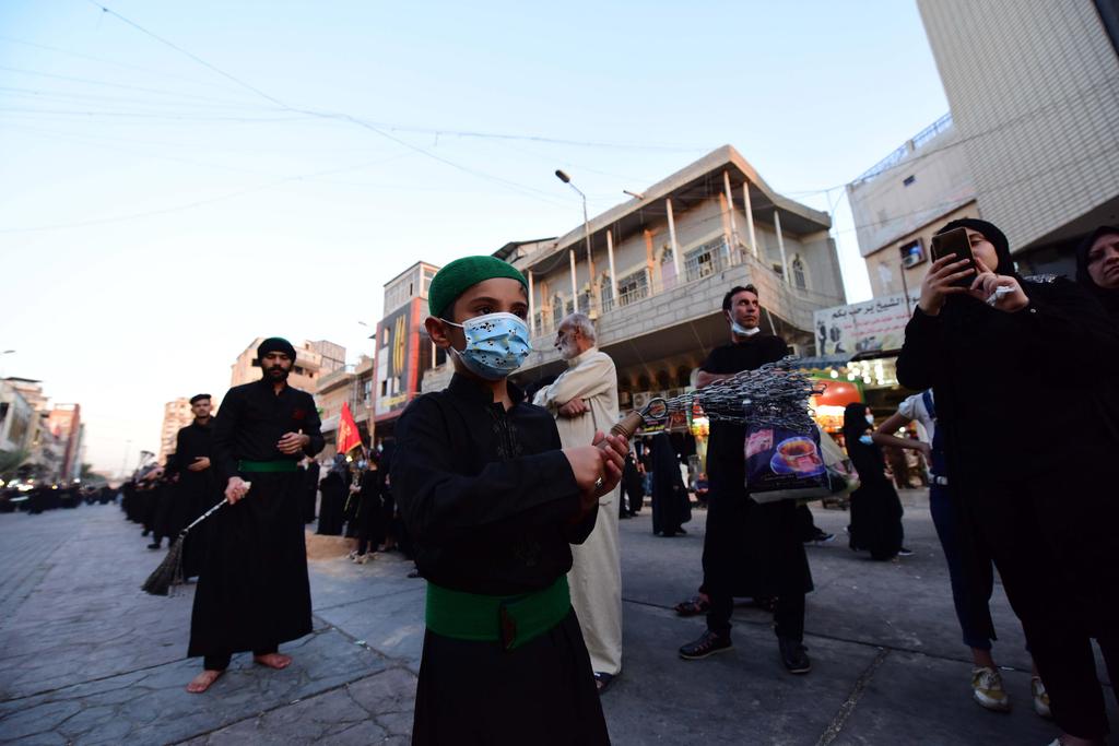 Iraqi Shiite Muslims take part in the religious festival of Ashura in Baghdad, Iraq 