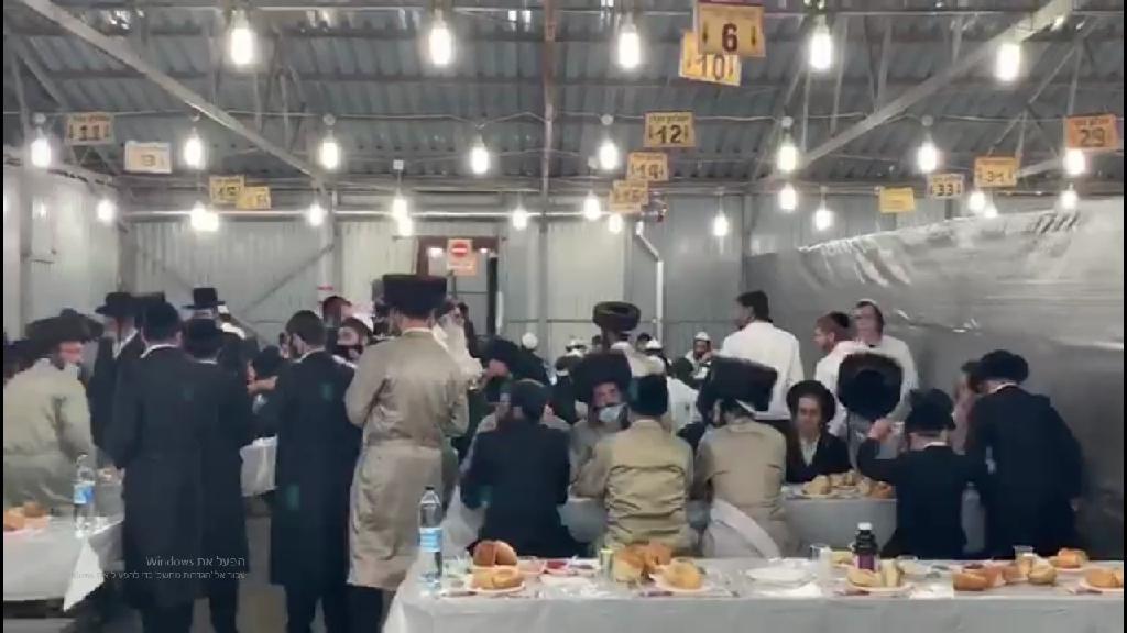  Ultra-Orthodox pilgrims to Uman congregate without maintaining social distancing regulations 