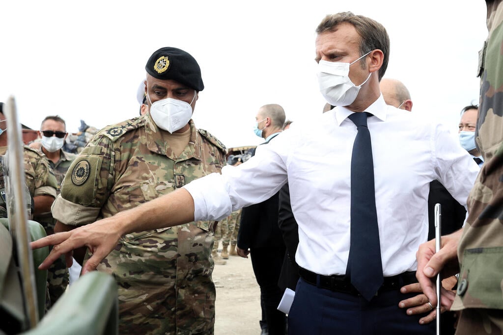 French President Emmanuel Macron meets with members of the military mobilised for the reconstruction of the port of Beirut, Sept. 1, 2020 