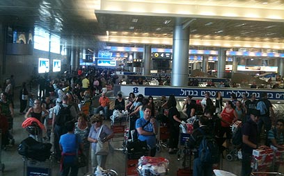 Passengers at a crowded Ben-Gurion Airport ahead of the Rosh Hashanah holiday in a previous year 