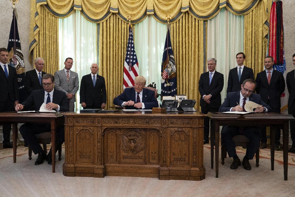 U.S. President Donald Trump, center, participates in a signing ceremony with the Serbian President Aleksandar Vucic, left, and Kosovan Prime Minister Avdullah Hoti at the White House Sept. 4, 2020 