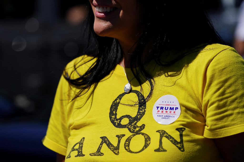 A supporter of U.S. President Donald Trump wears a QAnon shirt after participating in a caravan convoy circuit in Adairsville, Georgia, U.S. 
