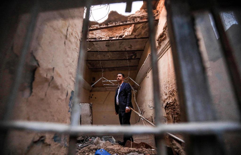 Ranj Abderrahman Cohen, an Iraqi Kurdish Jewish man, stands at a ruined Jewish synagogue in Arbil, the capital of the autonomous Kurdish region of northern Iraq, on July 5, 2020