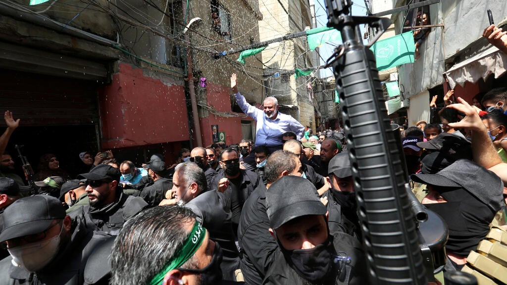 Palestinian group Hamas' top leader, Ismail Haniyeh, is carried during his visit at Ain el Hilweh Palestinian refugee camp in Sidon, Lebanon 