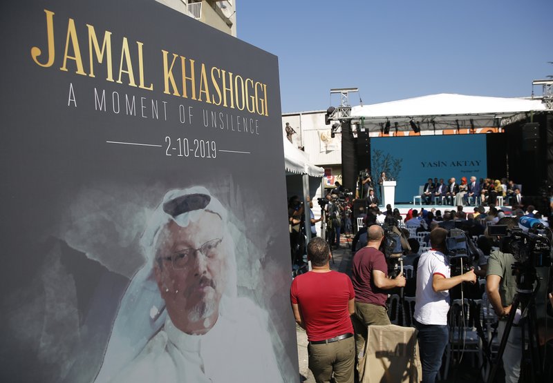 a picture of slain Saudi journalist Jamal Kashoggi, is displayed during a ceremony near the Saudi Arabia consulate in Istanbul, marking the one-year anniversary of his death 