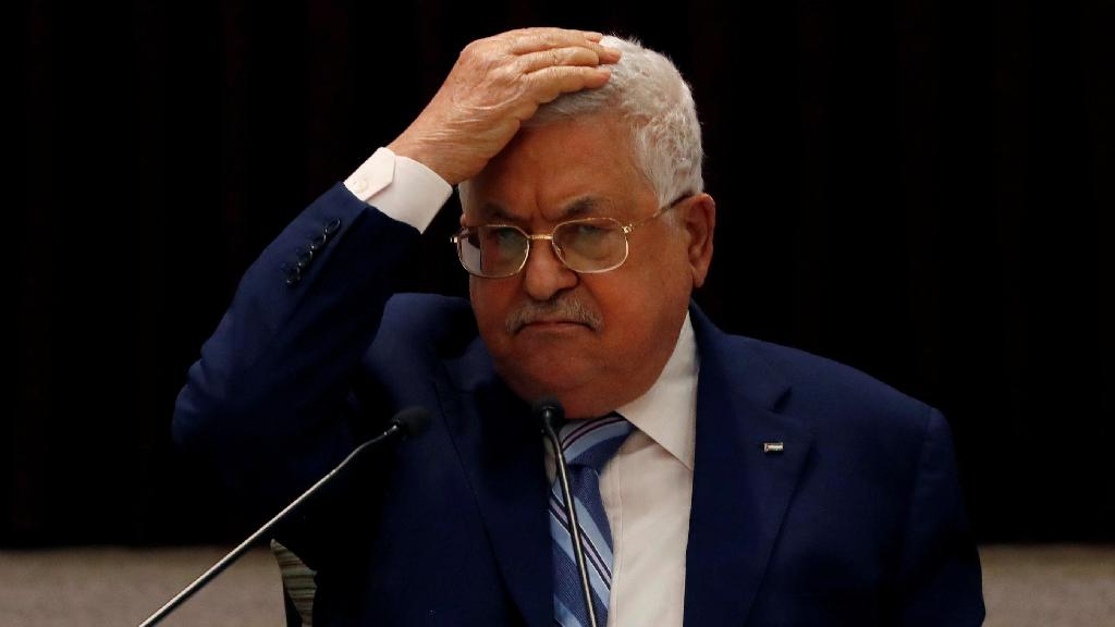 President Mahmoud Abbas gestures during a meeting with the Palestinian leadership to discuss the United Arab Emirates' deal with Israel to normalize relations