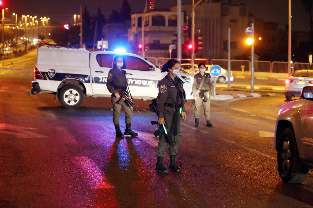 Police enforcing the curfew in a Jerusalem neighborhood on Tuesday night 