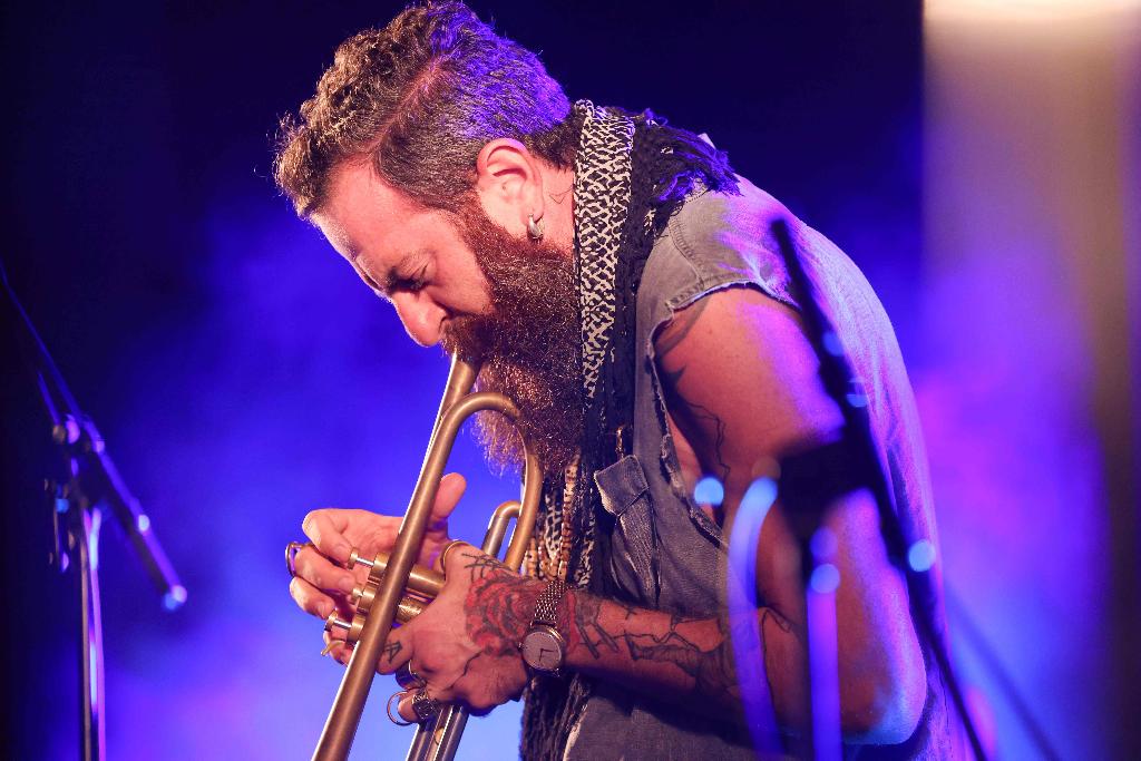 Avishai Cohen, the co-founder and artistic director of the event, performs on stage during the Jerusalem Jazz Festival 
