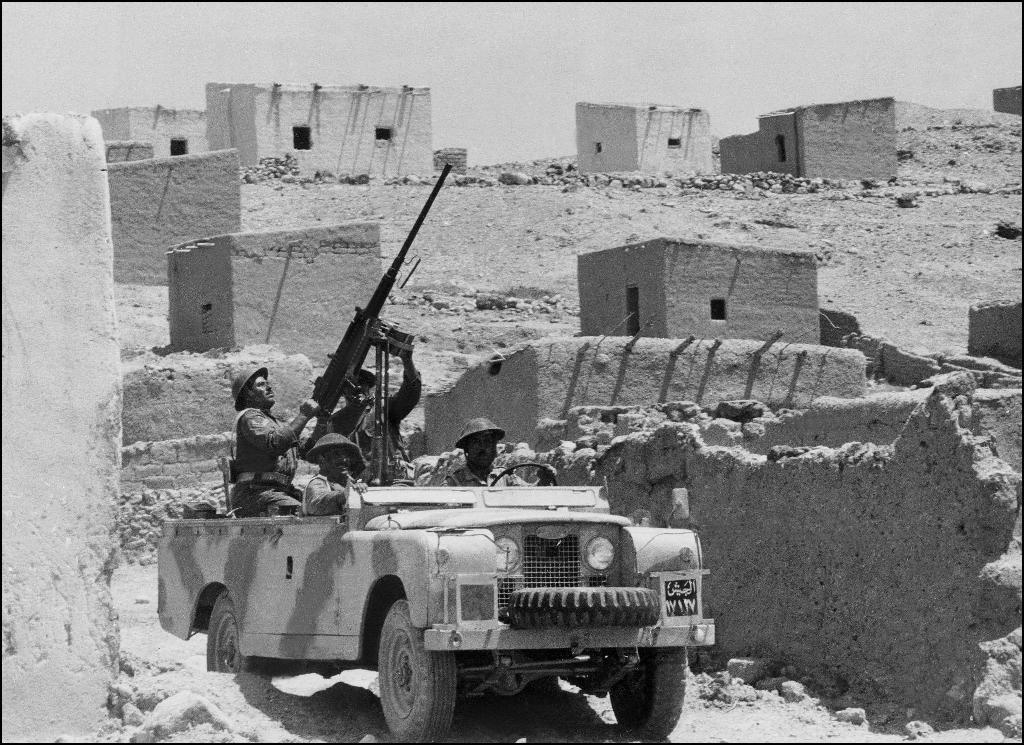 In this file photograph taken on October 29, 1970, Jordanian soldiers patrol in an armed jeep in the Jordan valley 