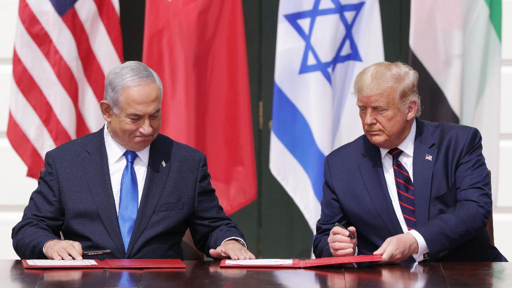 (L-R) Prime Minister of Israel Benjamin Netanyahu and U.S. President Donald Trump participate in the signing ceremony of the Abraham Accords