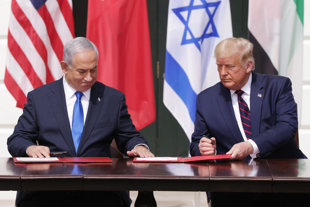 (L-R) Prime Minister of Israel Benjamin Netanyahu and U.S. President Donald Trump participate in the signing ceremony of the Abraham Accords