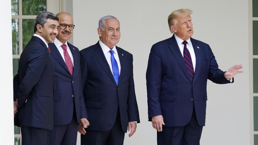 President Donald Trump walks to the Abraham Accords signing ceremony at the White House, Tuesday, Sept. 15, 2020, in Washington with Israeli Prime Minister Benjamin Netanyahu, Bahrain Foreign Minister Khalid bin Ahmed Al Khalifa and United Arab Emirates Foreign Minister Abdullah bin Zayed al-Nahyan
