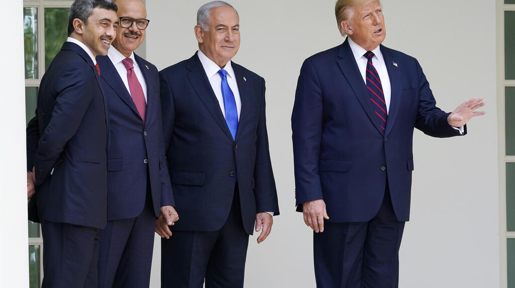 President Donald Trump walks to the Abraham Accords signing ceremony at the White House, Tuesday, Sept. 15, 2020, in Washington with Israeli Prime Minister Benjamin Netanyahu, Bahrain Foreign Minister Khalid bin Ahmed Al Khalifa and United Arab Emirates Foreign Minister Abdullah bin Zayed al-Nahyan