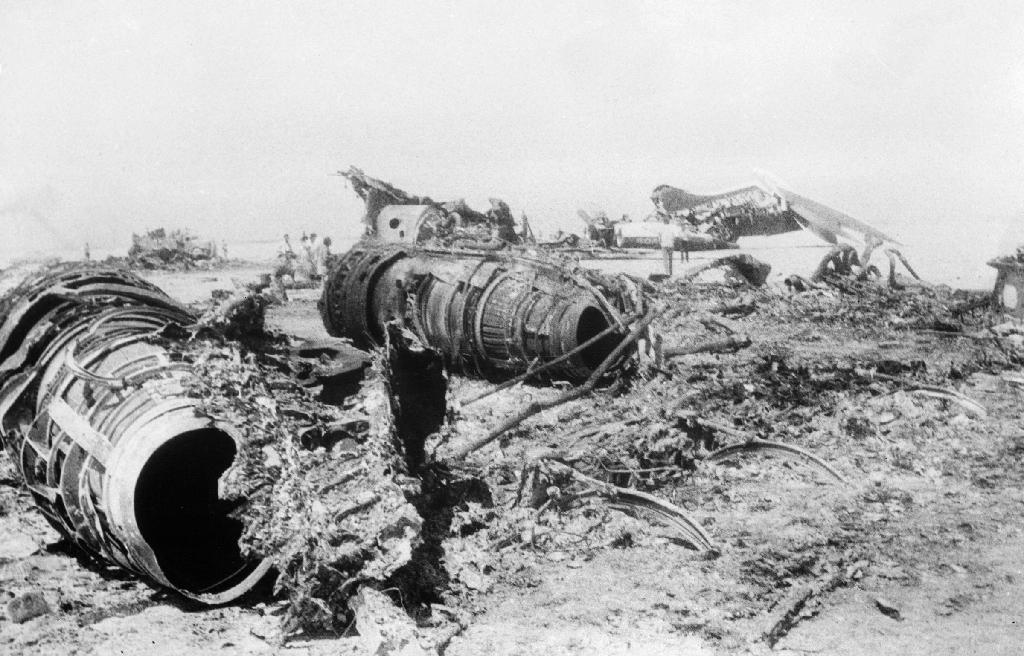 This file photograph taken on September 7, 1970, shows wreckage of the Swissair, TWA and BOAC aircraft in Zarka (Dawson's Field) in the Jordanian desert, which were hijacked September 6 and 9 1970 by The Popular Front for the Liberation of Palestine (PFLP), leading to the events of 'Black September'  
