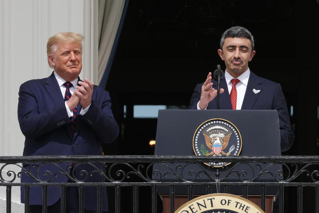  Foreign Affairs Minister of the United Arab Emirates Abdullah bin Zayed bin Sultan Al Nahyan speaks as U.S. President Donald Trump looks on during the signing ceremony of the Abraham Accords