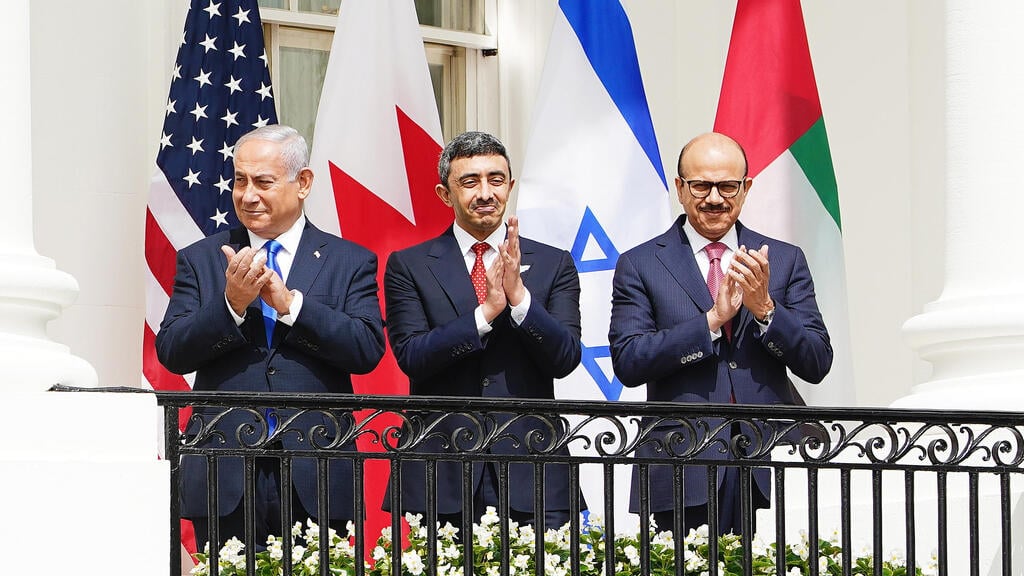 US President Donald J. Trump (L) speaks as (2L-R) Israeli Prime Minister Benjamin Netanyahu, UAE Foreign Affairs Minister Sheikh Abdullah bin Zayed bin Sultan Al Nahyan and Bahrain Foreign Affairs Minister Sheikh Khalid Bin Ahmed Al-Khalifa during the Abraham Accords signing ceremony