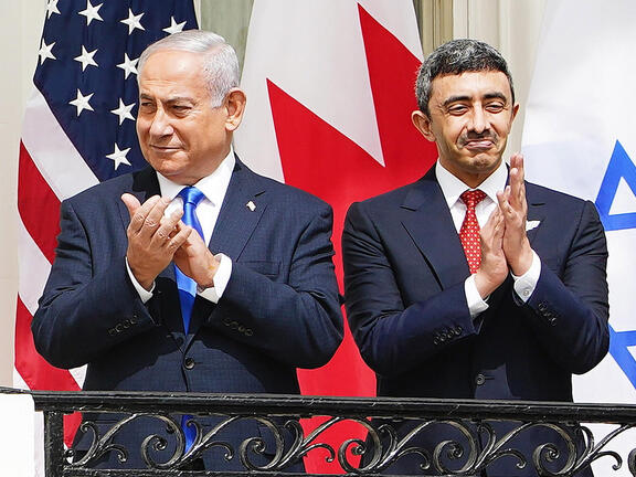 US President Donald J. Trump (L) speaks as (2L-R) Israeli Prime Minister Benjamin Netanyahu, UAE Foreign Affairs Minister Sheikh Abdullah bin Zayed bin Sultan Al Nahyan and Bahrain Foreign Affairs Minister Sheikh Khalid Bin Ahmed Al-Khalifa during the Abraham Accords signing ceremony