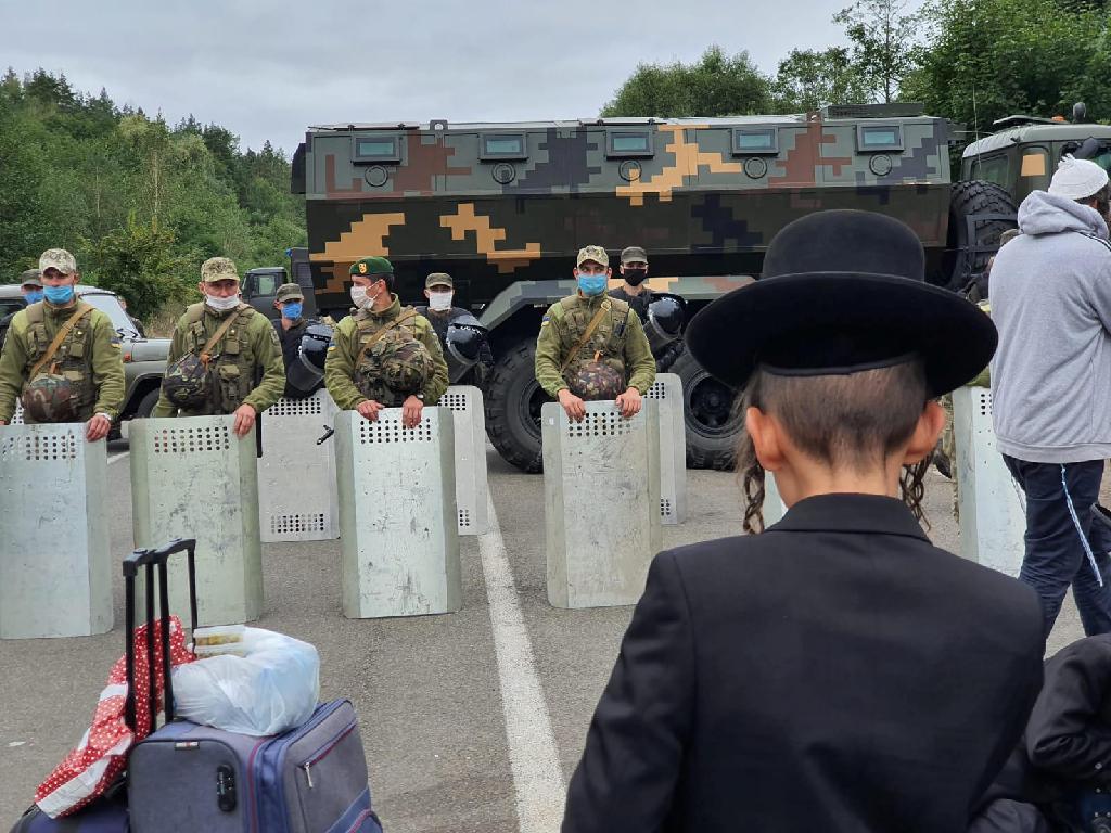 Jewish pilgrims, who plan to enter Ukraine from the territory of Belarus, gather at Novi Yarylovychi crossing point in Chernihiv Region, Ukraine 