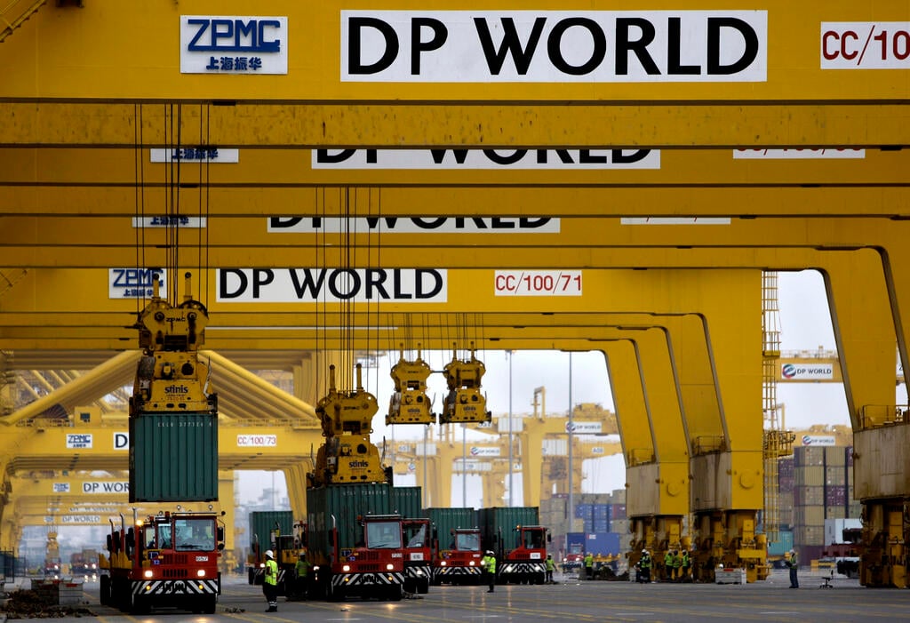  Cranes off load containers at the Jebel Ali Port, in Dubai, United Arab Emirates