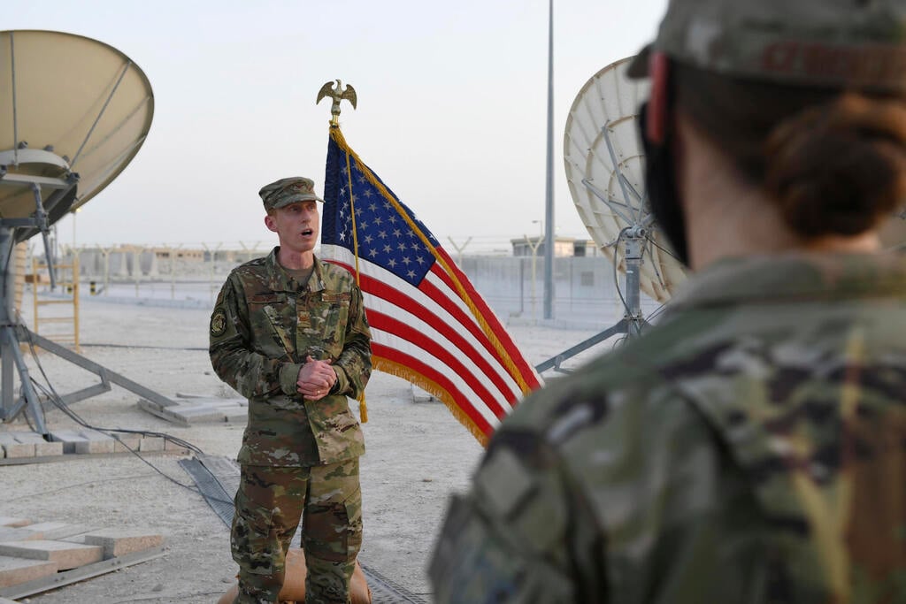 U.S. Air Force, Col. Todd Benson, the U.S. Air Force Central Command director of space forces, addresses members of the 379th Operations Support Squadron before they are sworn in as members of the Space Force at Al-Udeid Air Base, Qatar 