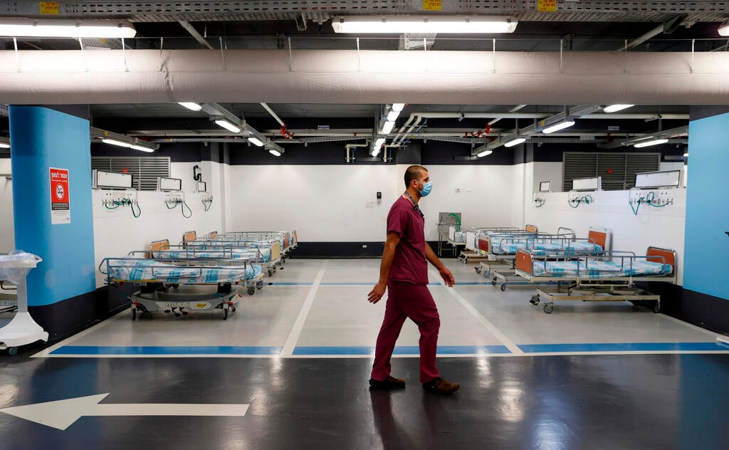 A partial view shows empty beds installed in the underground parking of Rambam Health Care Campus