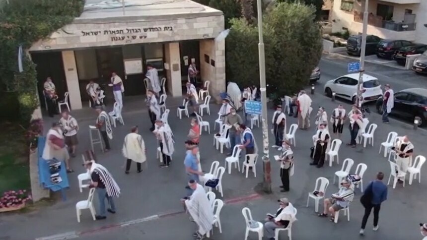  Israelis Jews observe social distancing while praying outdoors during the High Holidays in September 
