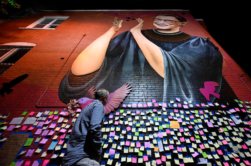 messages of thanks and gratitude taped on a mural memorial to late Supreme Court Justice Ruth Bader Ginsburg in downtown Washington