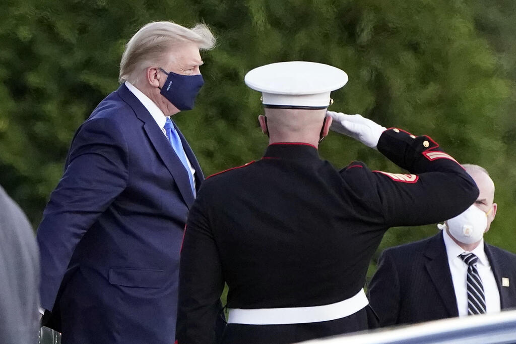 President Donald Trump arrives at Walter Reed National Military Medical Center, in Bethesda