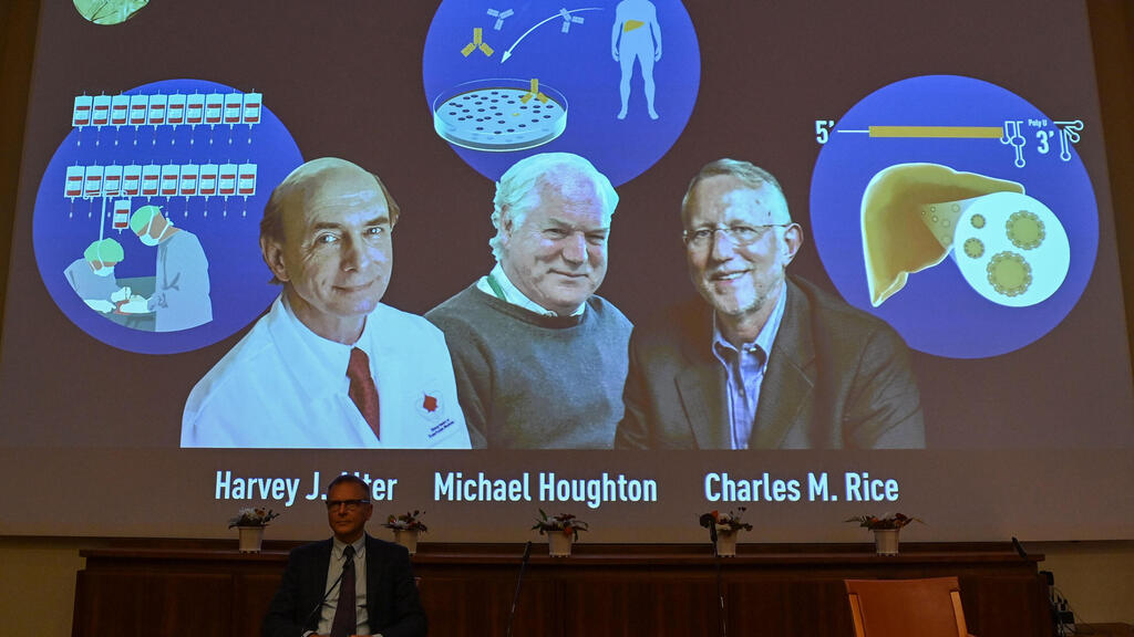 the Nobel Committee, speaks to announce the winners of the 2020 Nobel Prize in Physiology or Medicine (On screen L-R) American Harvey Alter, Briton Michael Houghton and American Charles Rice,
