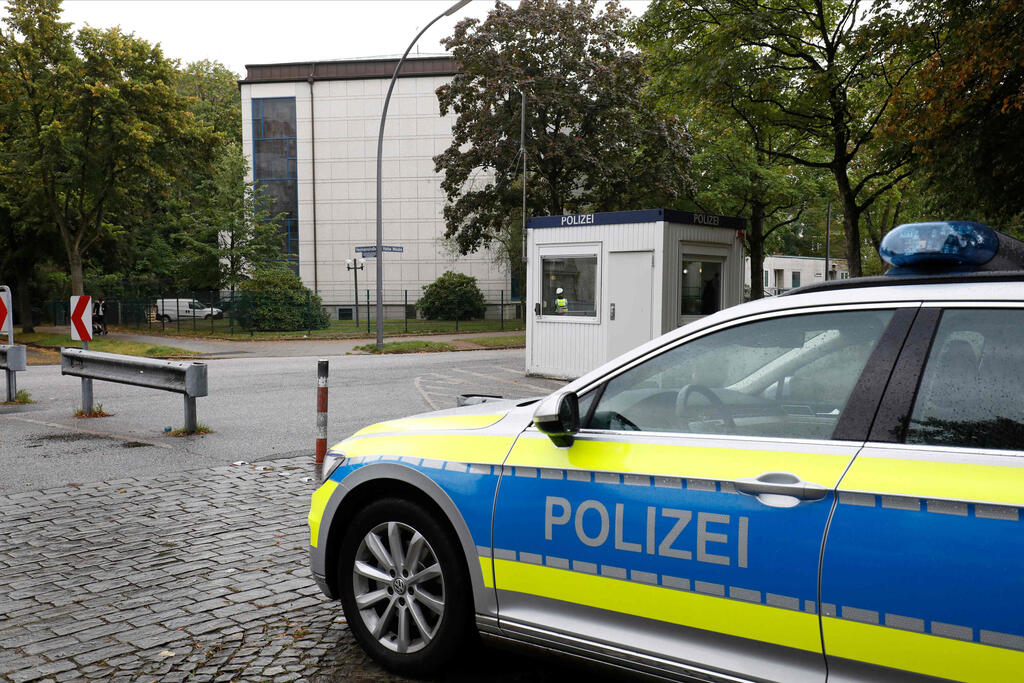 A police car stands in front of the Synagoge 'Hohe Weide' in Hamburg, northern Germany