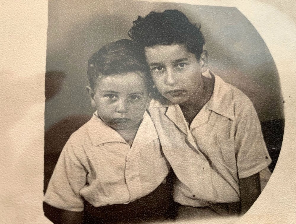 brothers and Holocaust survivors Moty Eisenberg, left, and Israel "Sasha" Eisenberg are photographed at the Hallein Displaced Persons Camp in Austria in 1949 