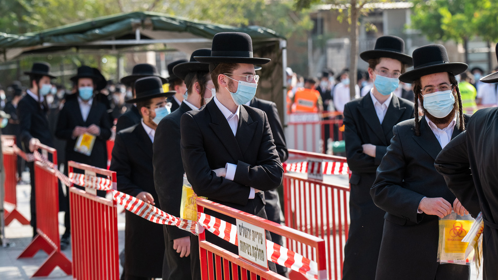 Yeshiva students waiting in line to get tested in Jerusalem 