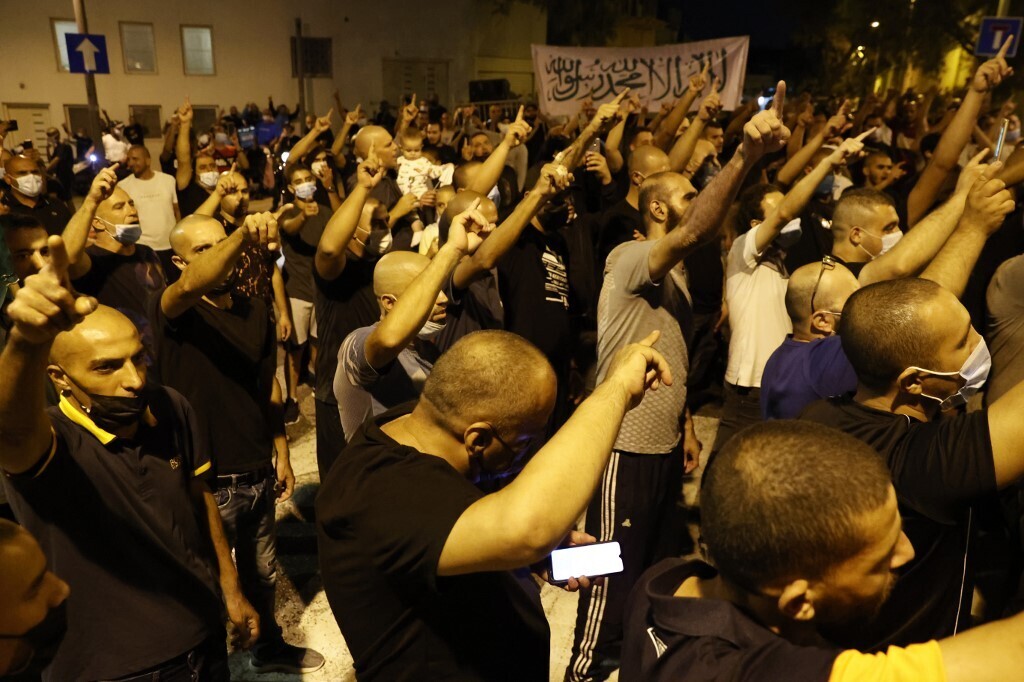 Arab-Israeli protesters gather outside the residence of the French Ambassador to Israel, in Tel Aviv 