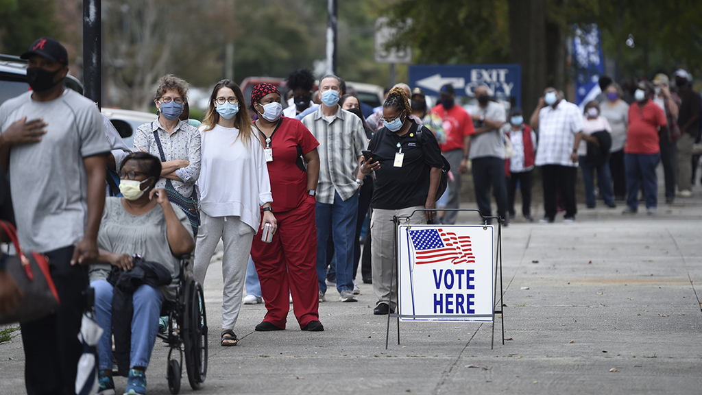 Voters wait in line to cast their ballot early in Augusta, Georgia 