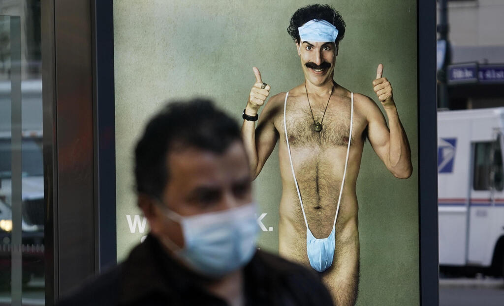 Bus stop ad for 'Borat 2' featuring actor Sacha Baron Cohen, ahead of its release on October 23
