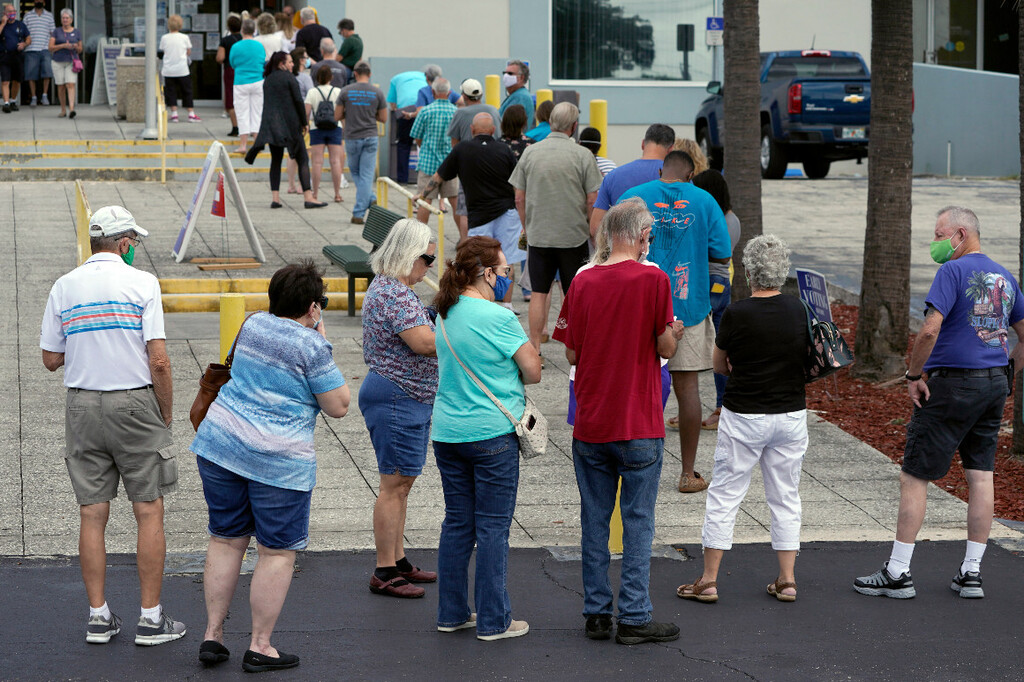 People line up at a Florida polling station to cast their early ballots 