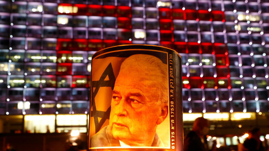A poster of assassinated prime minister Yitzhak Rabin during a memorial rally in Tel Aviv on Saturday 