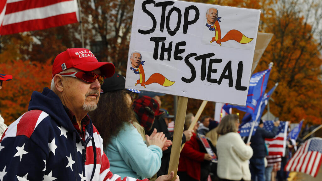 Supporters of President Donald Trump attend a rally to protest against President-elect Joe Biden's win
