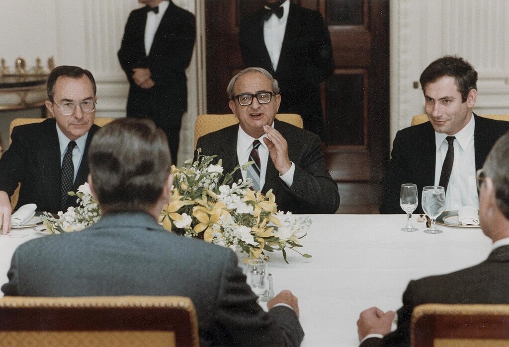 Netanyahu (right) at a dinner at the White House as Israel's Axis in Washington, January 5, 1983. Seated with President Yitzhak Navon (center) and Israeli Ambassador to the United States Moshe Arens (left) 