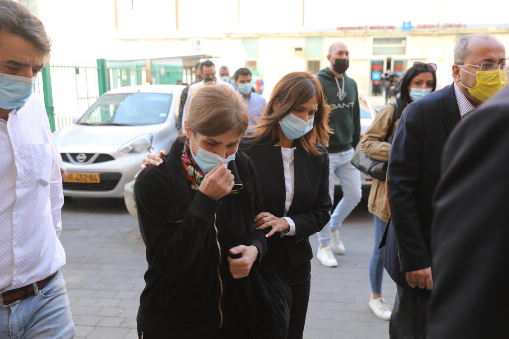 Saeb Erekat's wife Neameh and his daughter Salam arrive at Hadassah Medical Center in Ein Kerem, Jerusalem after his death, November 10, 2020 