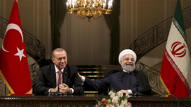 Turkish President Recep Tayyip Erdoğan, left, meeting with Iranian counterpart Hassan Rouhani in Tehran 