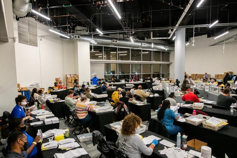  Employees of the Fulton County Board of Registration and Elections process ballots in Atlanta, Georgia on November 4