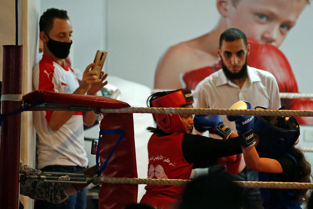 Palestinian girls take part in a rare boxing championship in Gaza City 