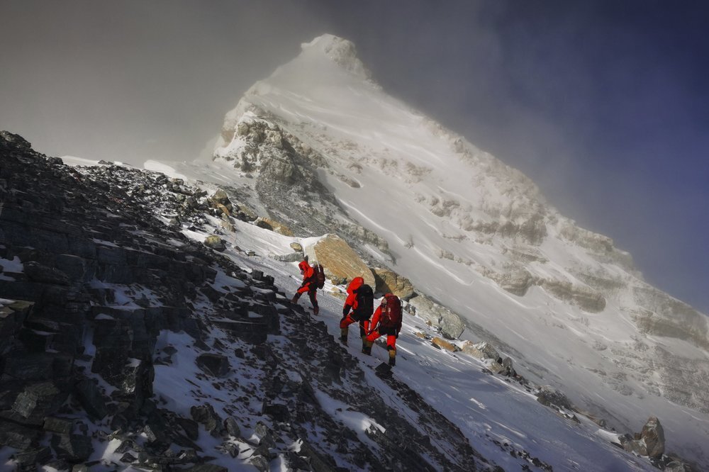 members of a Chinese surveying team head for the summit of Mount Everest 
