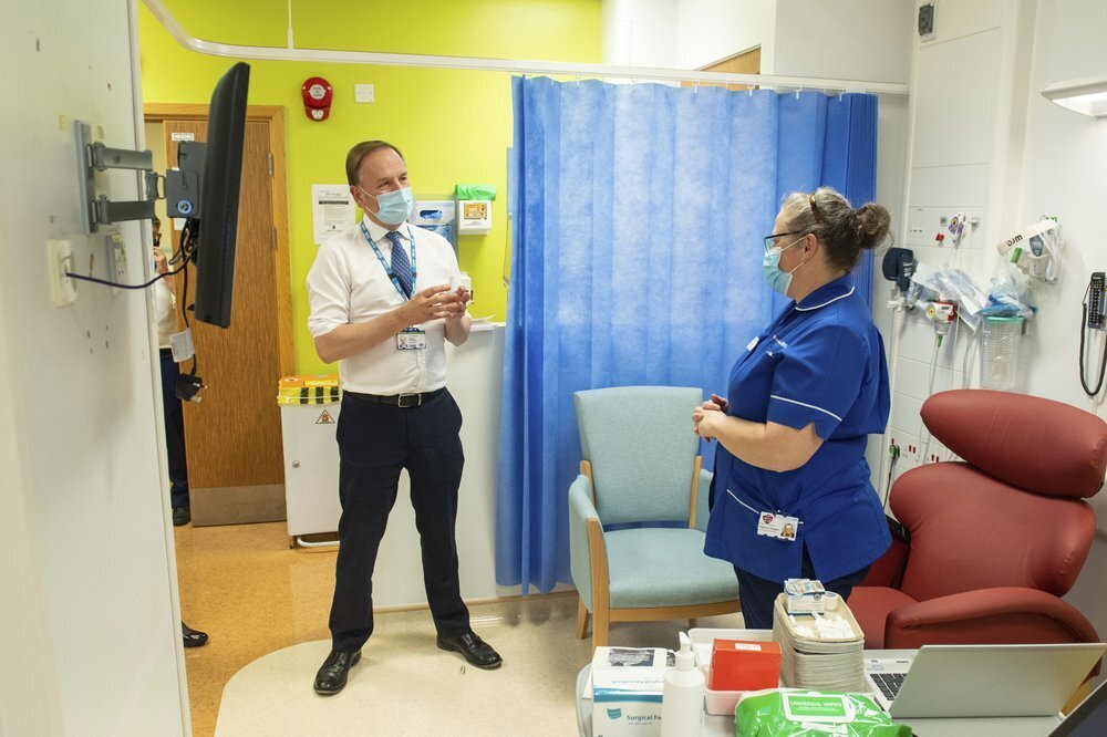 Sir Simon Stevens looks at the freezer facility at the Royal Free Hospital in London (Photo: AP) Sir Simon Stevens, the Chief Executive of the National Health Service in England, looks at the freezer facility at the Royal Free Hospital in London