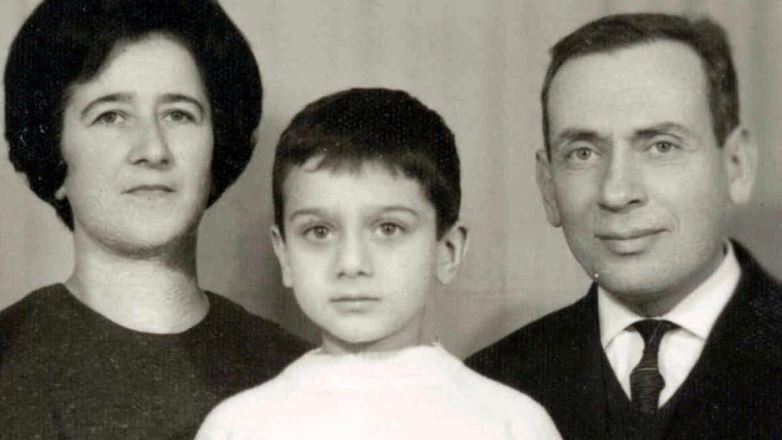Elie Abadie with his parents in a travel document photo, 1968