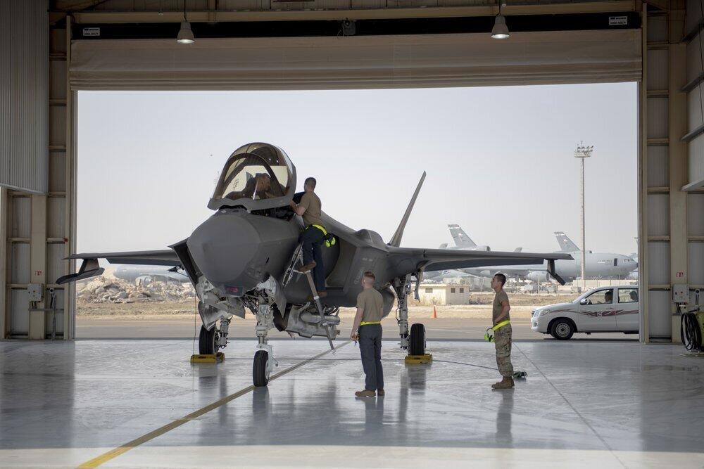 an F-35 fighter jet pilot and crew prepare for a mission at Al-Dhafra Air Base in the United Arab Emirates 
